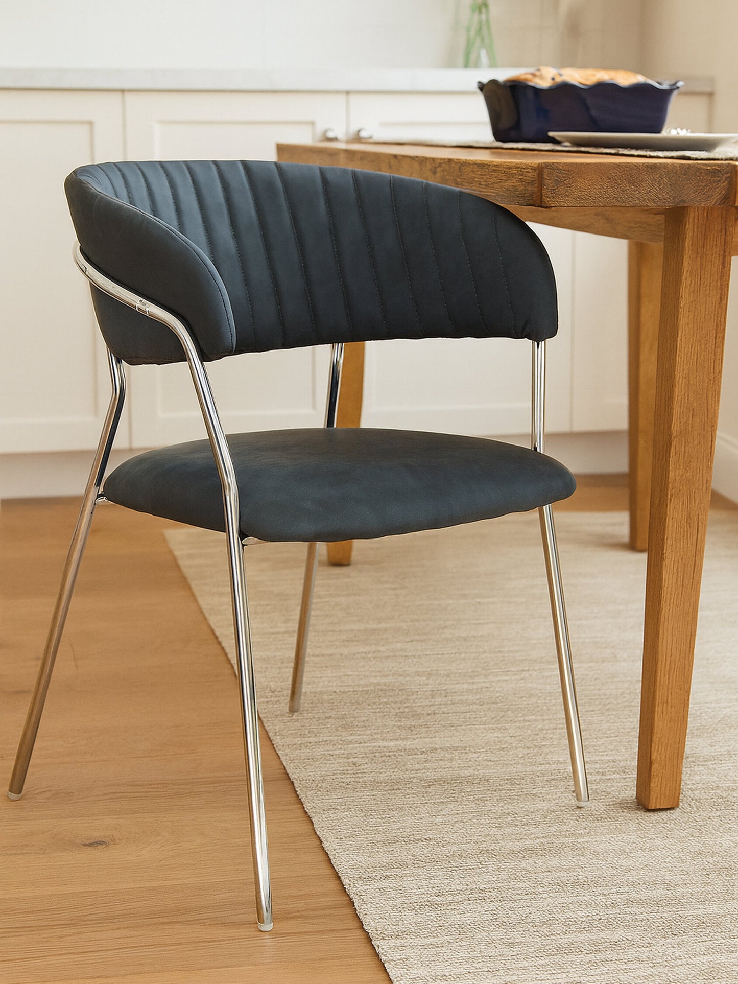 Lorena Dark Grey Leather Effect Curved Dining Chair