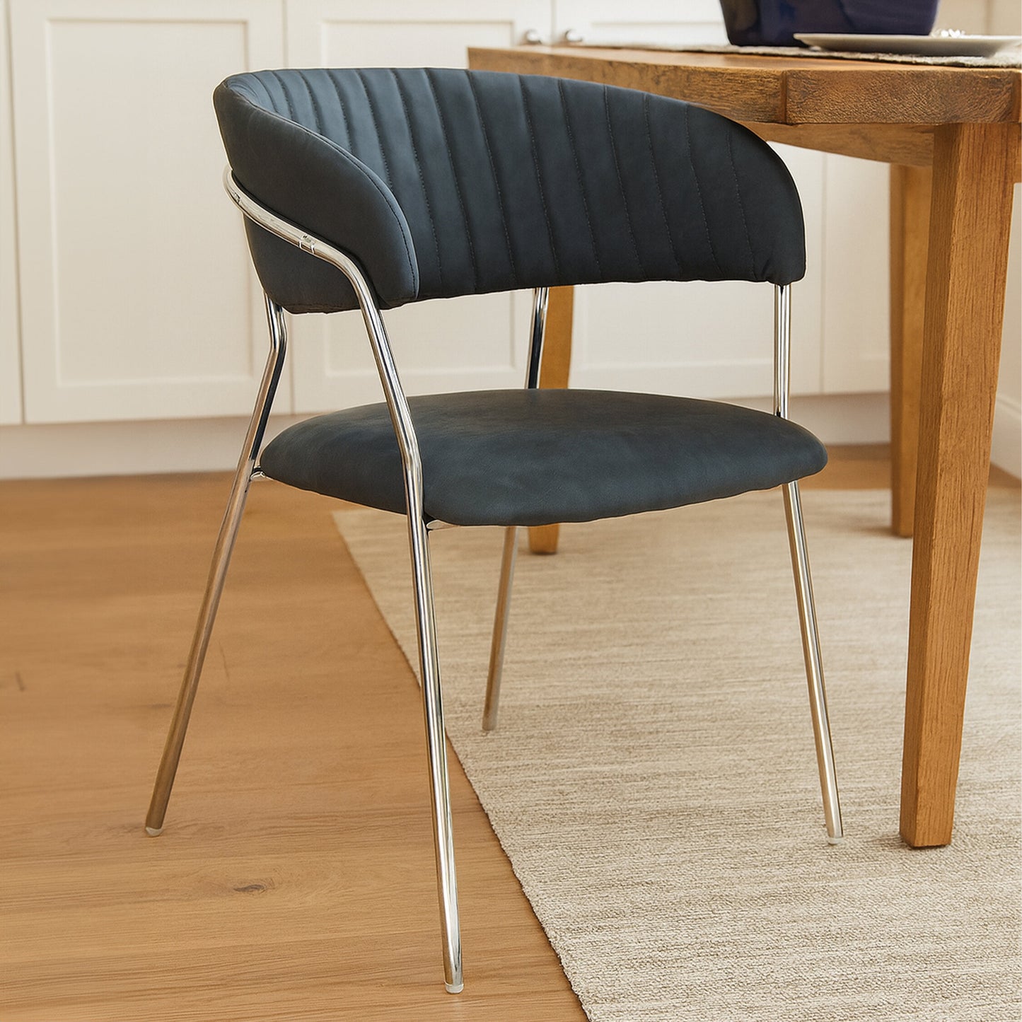 Lorena Dark Grey Leather Effect Curved Dining Chair